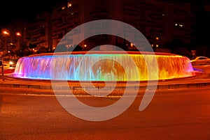 Beautiful illuminated colorful fountain at night time