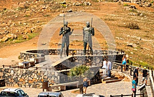 beautiful image of the large statues at Mirador de Guise y Ayose near Betancuria in Fuerteventura Canary Islands