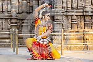 Beautiful indian dancer in the posture of Indian dance.Indian classical dance odissi.