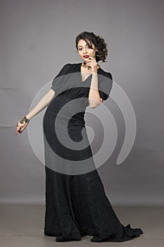 Beautiful indian female model in a beautiful black gown