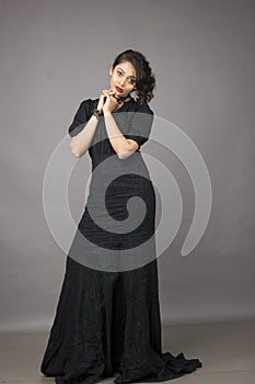 Beautiful indian female model in a beautiful black gown