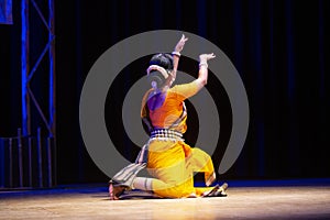 Beautiful indian girl dancer in the posture of Indian classical dance odissi. Cultural Dance of India.