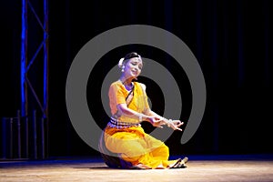 Beautiful indian girl dancer in the posture of Indian classical dance odissi. Cultural Dance of India.