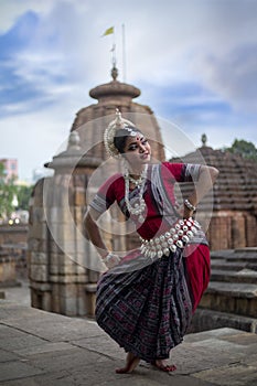 Beautiful indian girl dancer in the posture of Indian dance.Indian classical dance Odissi.