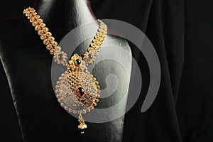 Indian Traditional Snacks MurukkuIndian Traditional Gold Necklace with Gemstones