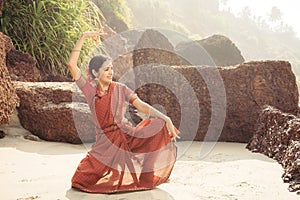 Beautiful indian woman dancer in traditional clothing