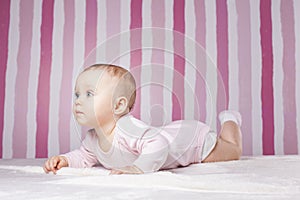 Beautiful infant portrait on colorful background.