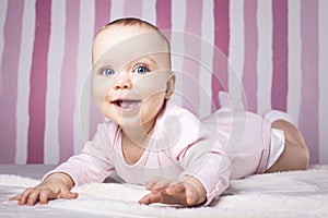 Beautiful infant portrait on colorful background.