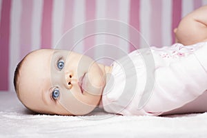 Beautiful infant portrait on colorful background.