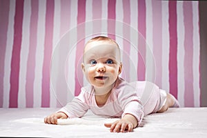 Beautiful infant portrait on colorful background.