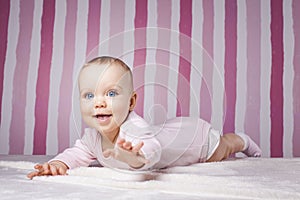 Beautiful infant portrait on colorful background.