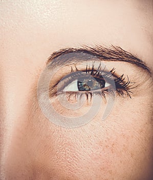 A beautiful insightful look woman`s eye. Close up shot.