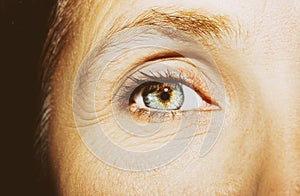 A beautiful insightful look woman`s eye. Close up shot.