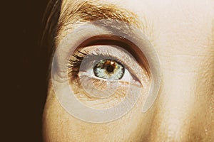 A beautiful insightful look woman`s eye. Close up shot.