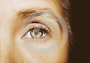 A beautiful insightful look woman`s eye. Close up shot.