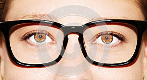 A beautiful insightful look woman`s eye. Woman wearing glasses. Close-up shot