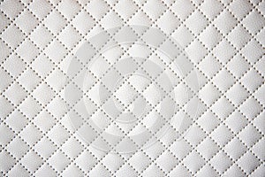Interesting original white leather background with quilting pattern
