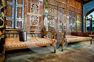 Beautiful interior design of traditional iranian restaurant with ottoman couches