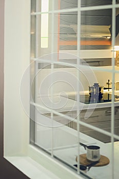 Beautiful interior, view of the kitchen through the window