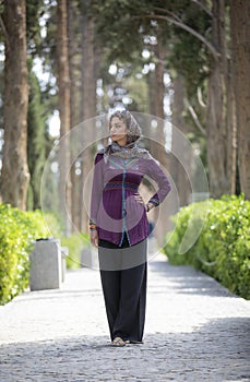 Beautiful iranian woman in Fin gardens