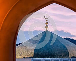 Beautiful Islam sign moon on masque with evening sky background