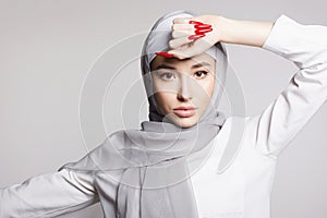 beautiful islamic young woman with long Nails