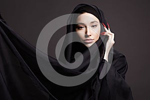 beautiful islamic young woman with long Nails. beauty girl in hijab