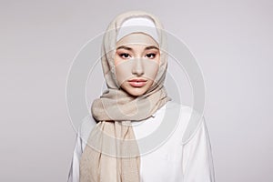 beautiful islamic young woman with Make-up. beauty girl in hija photo