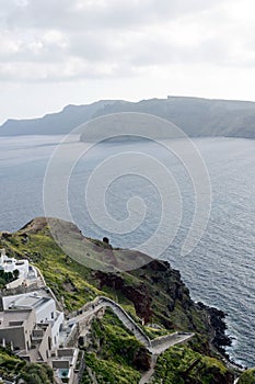 Beautiful island of Santorini, Greece. Traditional white greek houses against the backdrop of the sea. The city of Oia on the