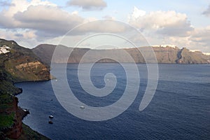 Beautiful island of Santorini, Greece. Traditional white greek houses against the backdrop of the sea. The city of Oia on the isla