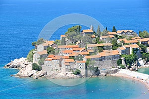The beautiful island of Sveti Stefan Sveti Stephan in the Adriatic sea in the summer. Montenegro