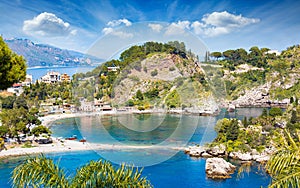 Beautiful Isola Bella, small island near Taormina, Sicily, Italy. Narrow path connects island to mainland Taormina beach