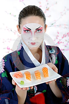Beautiful japan geisha woman with sushi