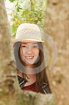 Beautiful japanese descendant woman on a nature scene