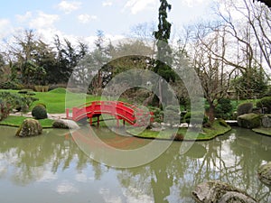 Beautiful Japanese garden in the city of Toulouse with lake and bridge