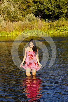 Beautiful Japanese Woman Standing In River Reflection