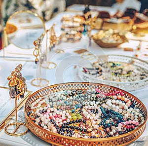 beautiful jewelry on the table, jewelry with healing stones.