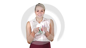 Beautiful joyful girl with Euro bills on white background.