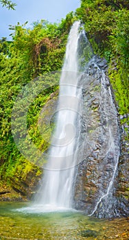 Beautiful Kaeng Nyui Waterfalls. Laos landscape. Vertical panorama