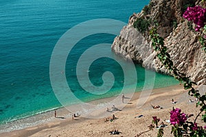 Beautiful Kaputas beach with bougainvillea flowers in the background. December. Turkey Antalya Kemer