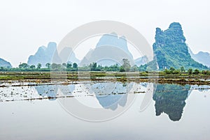 Beautiful Karst mountains and rural scenery in spring