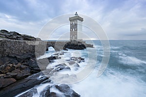 Beautiful Kermorvan lighthouse, most western part of France, Le Conquet, Bretagne, France Stormy weather in coastline.