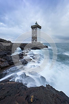 Beautiful Kermorvan lighthouse, most western part of France, Le Conquet, Bretagne, France Stormy weather in coastline.