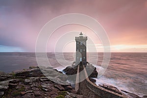 Beautiful Kermorvan lighthouse, most western part of France, Le Conquet, Bretagne, France Stormy weather in coastline.