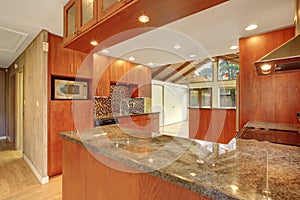 Beautiful kitchen with marble counters.