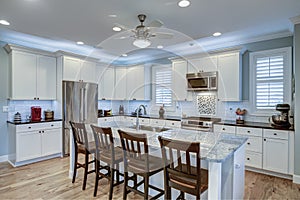Beautiful kitchen remodel with white cabinets and new appliances