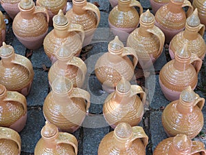 Beautiful kitchen utensils made of clay by hand by expert hands photo