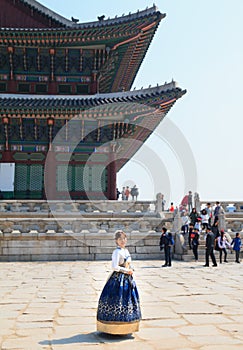 Beautiful Korean woman dressed Hanbok, Korean traditional dress, in Gyeongbokgung Palace