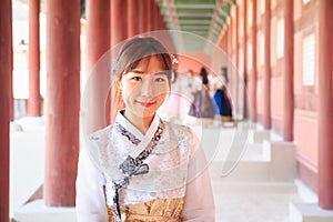 Beautiful Korean woman dressed Hanbok in Gyeongbokgung Palace in Seoul