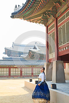 Beautiful Korean woman dressed Hanbok, Korean traditional dress, in Gyeongbokgung Palace